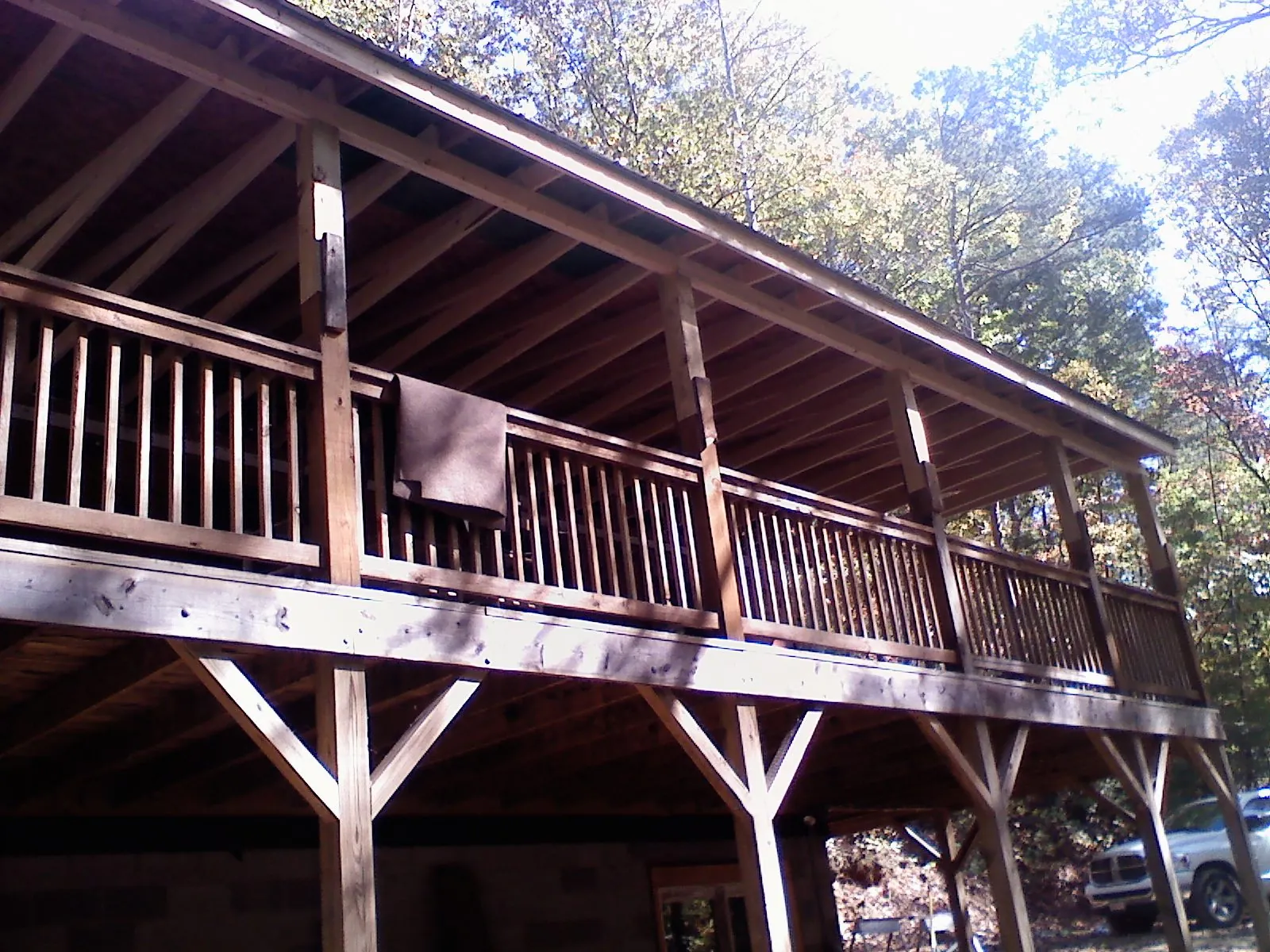 Timber framing under a new elevated porch and deck — Roof Leak Repair in Campton by Roofing Brothers